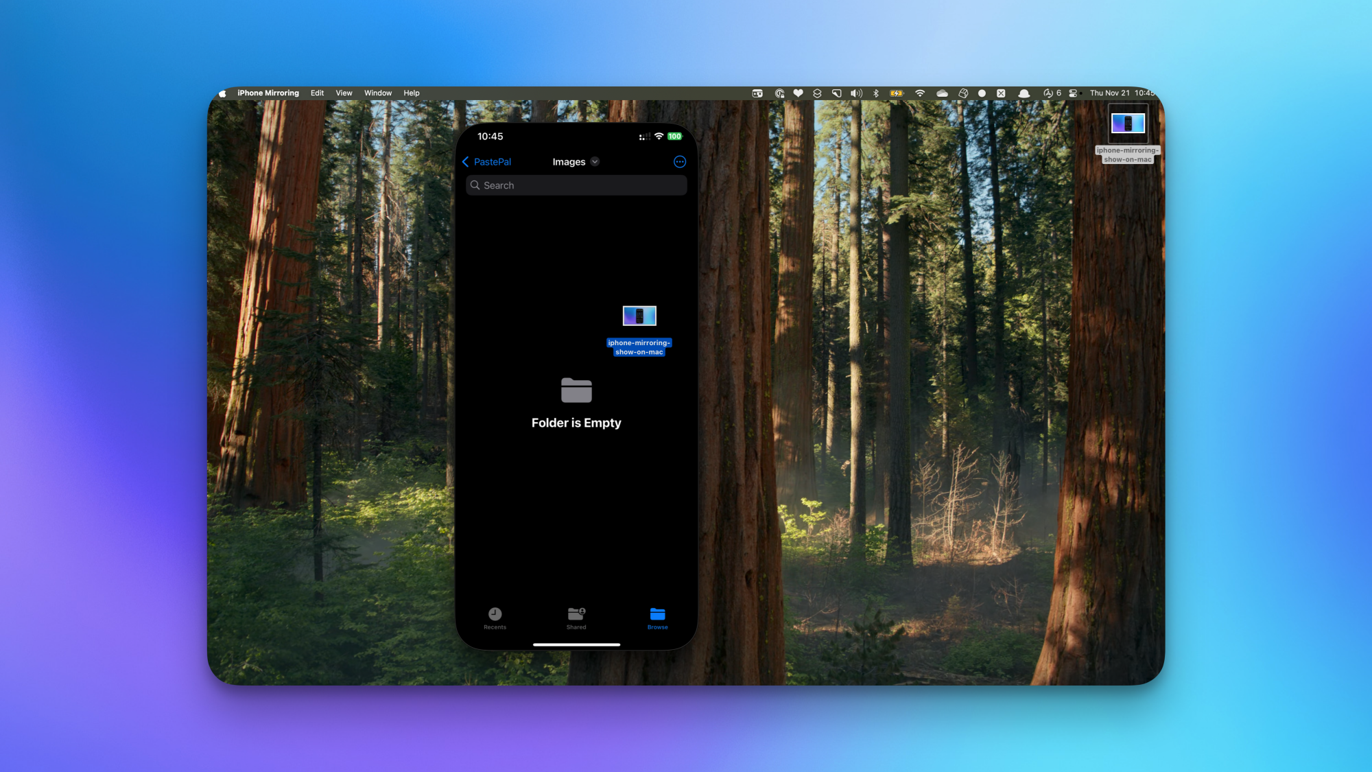 Une fenêtre de Miroir d'iPhone sur le Mac, affichant la fonctionnalité qui permet de glisser-déposer des fichiers d'un iPhone vers un Mac et vice-versa.